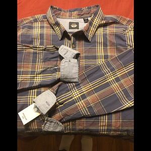 Mens plaid shirt. Dockers. XXL. Denim look on sleeves. Blue background.
